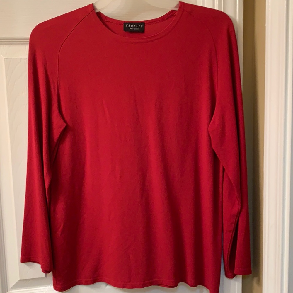 Deep red sheer long sleeve blouse.